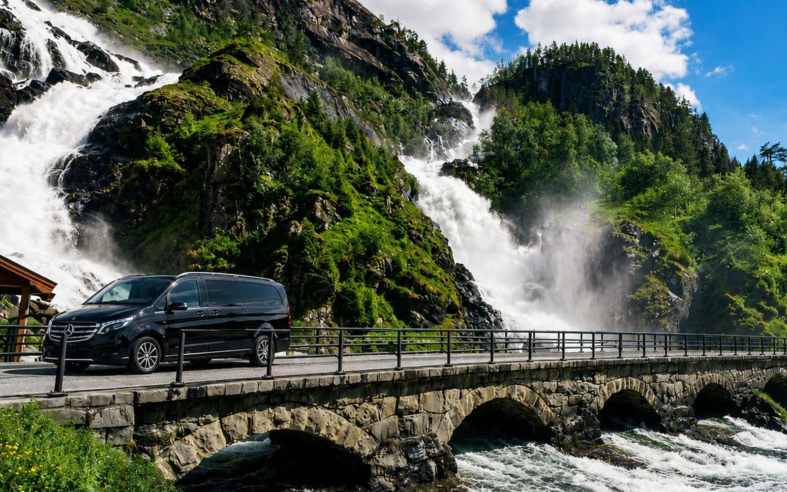 A private Mercedes beside a waterfall in Hardanger